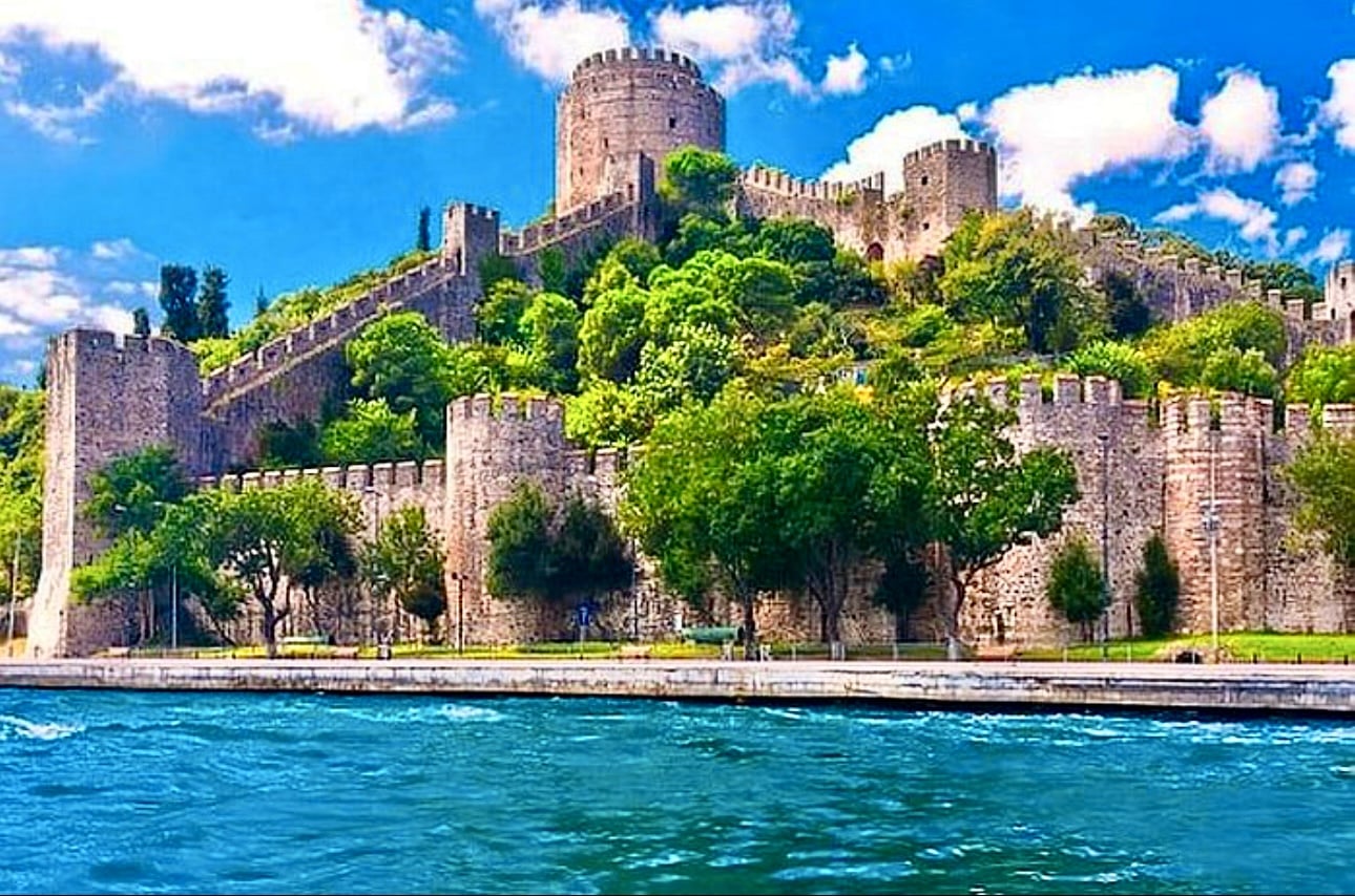 Rumeli Fortress's towers and walls climbing the hill above the Bosphorus