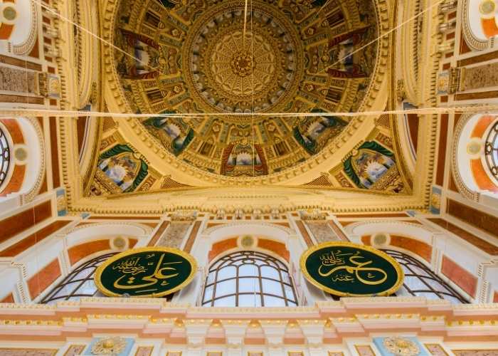 The painted dome of Ortaköy Mosque with its calligraphy roundels